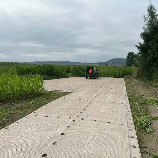 Installing Temporary Roadway Mats on Slopes and Soft Ground