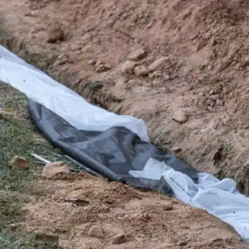 Installing Geotextile in a French Drain_ The Burrito Wrap
